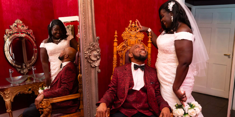 Lloyd Dunkley Photography, At Colwick Hall in Nottingham, a wedding couple smiles as the groom gazes up at his bride.